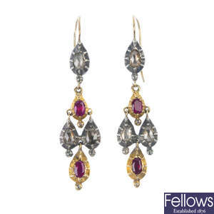 A pair of diamond and ruby ear pendants.