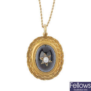 A late 19th century gold split pearl garnet and diamond pendant, with chain. 
