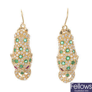 A pair of diamond, emerald and ruby leopard head ear pendants. 