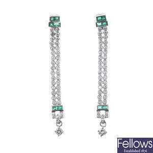 A pair of 18ct gold diamond and emerald ear pendants.