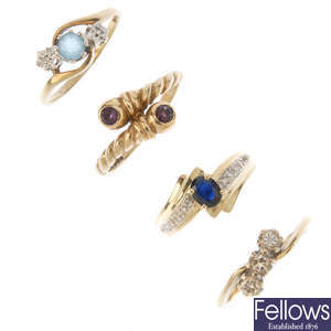 A selection of four dress rings.