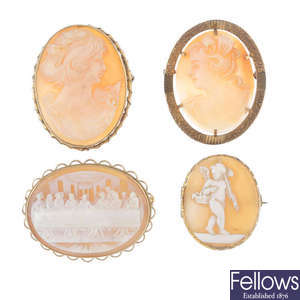 A selection of four 9ct gold shell cameo brooches.