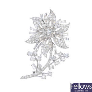 A diamond floral spray brooch.