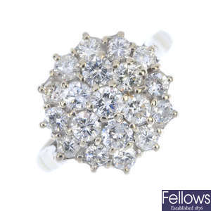 A diamond cluster ring.
