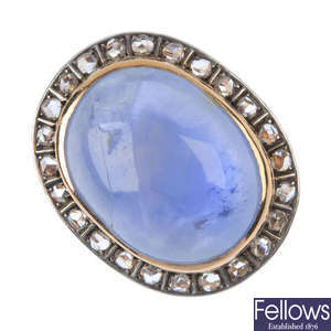 A sapphire and diamond cluster ring. 