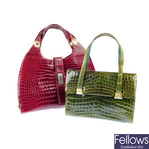Two dyed crocodile leather handbags. 