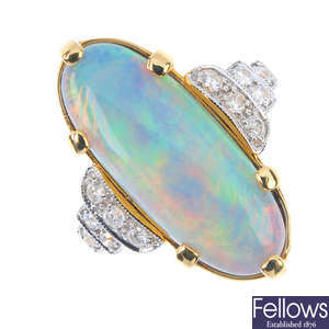 An 18ct gold opal and diamond dress ring. 