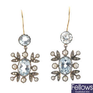 A pair of topaz, diamond and split pearl ear pendants. 