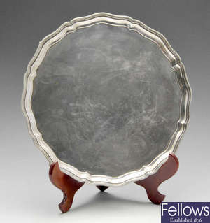 A twentieth century silver salver, together with a silver plated tray and basket. 