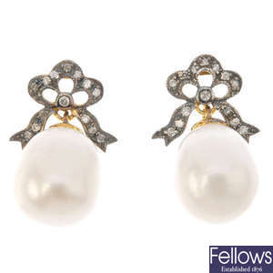 A pair of cultured pearl ear pendants. 
