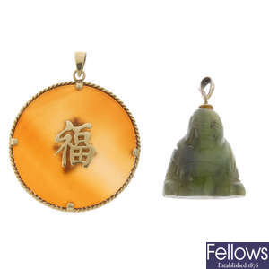 Two hardstone pendants.