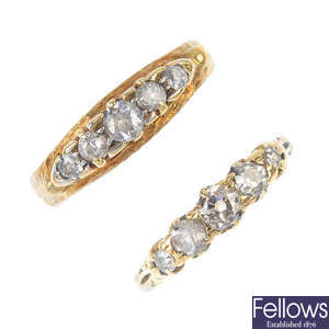 Two diamond five-stone rings.