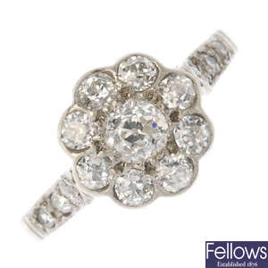 A mid 20th century 18ct gold and platinum diamond floral cluster ring.
