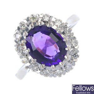 An amethyst and diamond cluster ring.