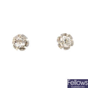 A pair of old-cut diamond single-stone ear studs. 