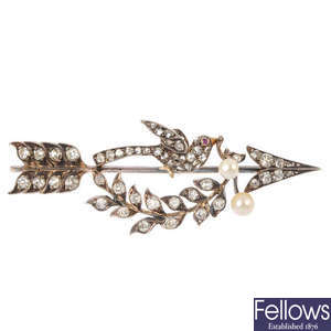 A late 19th century silver and gold diamond and gem-set brooch.
