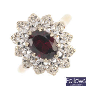 An 18ct gold garnet and diamond cluster ring. 