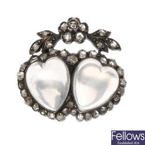 An early 20th century diamond and moonstone brooch.