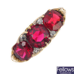 A garnet-topped doublet three-stone ring.