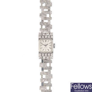 OMEGA - a lady's mid 20th century diamond wristwatch.