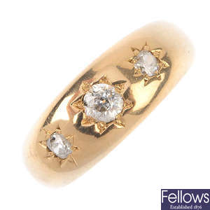 An Edwardian 18ct gold diamond three-stone ring.