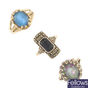 A selection of three gem-set rings.