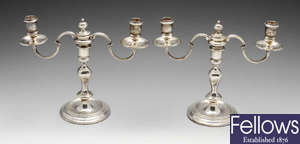 A pair of 1960's silver twin-branch candelabra.