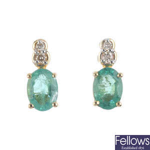 A pair of 14ct gold emerald and diamond earrings.