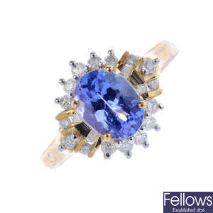 A 9ct gold tanzanite and diamond cluster ring.