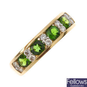 An 18ct gold diopside and diamond dress ring.