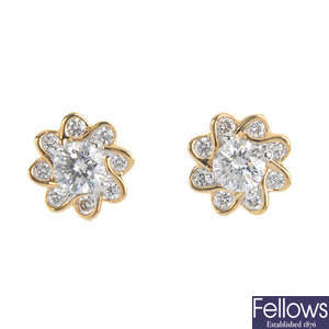 A pair of 18ct gold diamond floral cluster earrings.