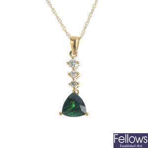 An 18ct gold garnet and diamond pendant, with chain.