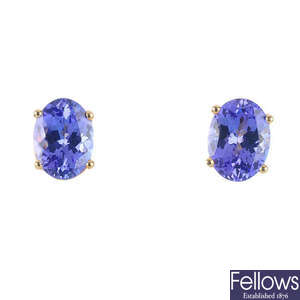 A pair of 18ct gold tanzanite single-stone earrings.