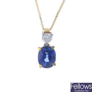 A sapphire and diamond pendant, with chain.