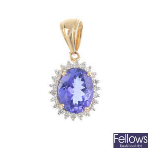 An 18ct gold tanzanite and diamond cluster pendant.