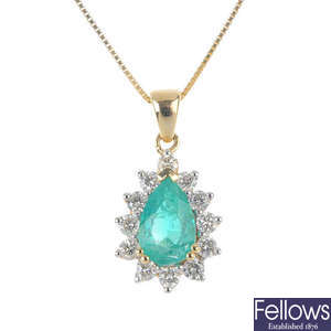 An 18ct gold emerald and diamond pendant, with chain.