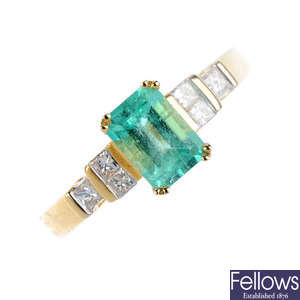 A 14ct gold Columbian emerald and diamond ring.
