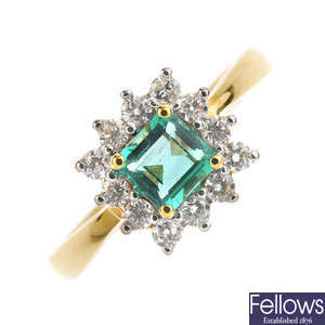 An 18ct gold Columbian emerald and diamond cluster ring.