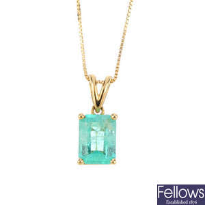 An 18ct gold Colombian emerald single-stone pendant, with chain.