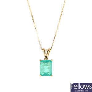 An 18ct gold Columbian emerald pendant, with chain.