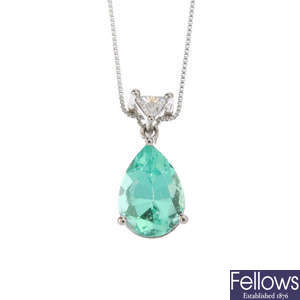 A platinum Columbian emerald and diamond pendant, with chain.