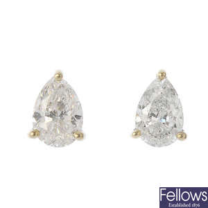 A pair of 18ct gold pear-shape diamond ear studs.