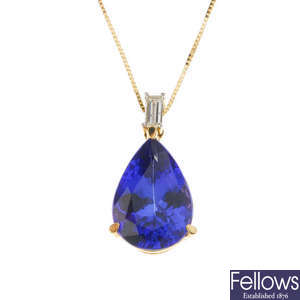 An 18ct gold tanzanite and diamond pendant, with chain.