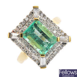 An 18ct gold Columbian emerald and diamond cluster ring.