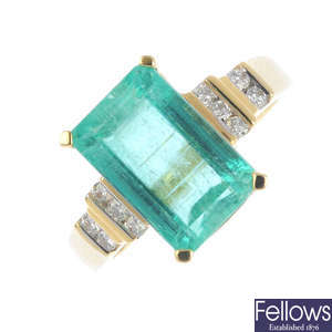 An 18ct gold Columbian emerald and diamond ring.