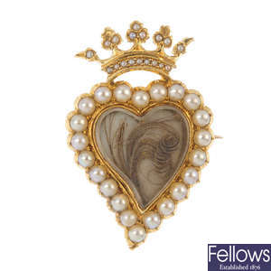 A late 19th century gold split pearl heart brooch.