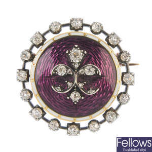 A late 19th century silver and gold diamond and enamel brooch.