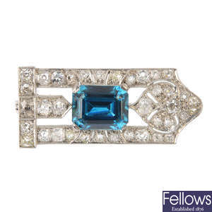 A zircon and diamond brooch.