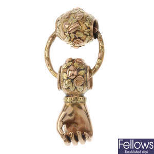 A late 19th century tri-colour gold figa pendant.