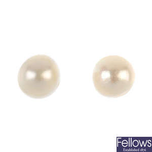 A pair of pearl ear studs.